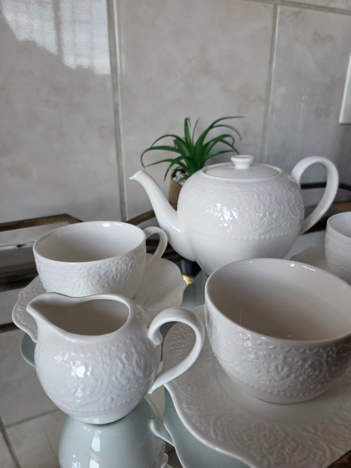 14-piece elegant tea set arranged on dining table