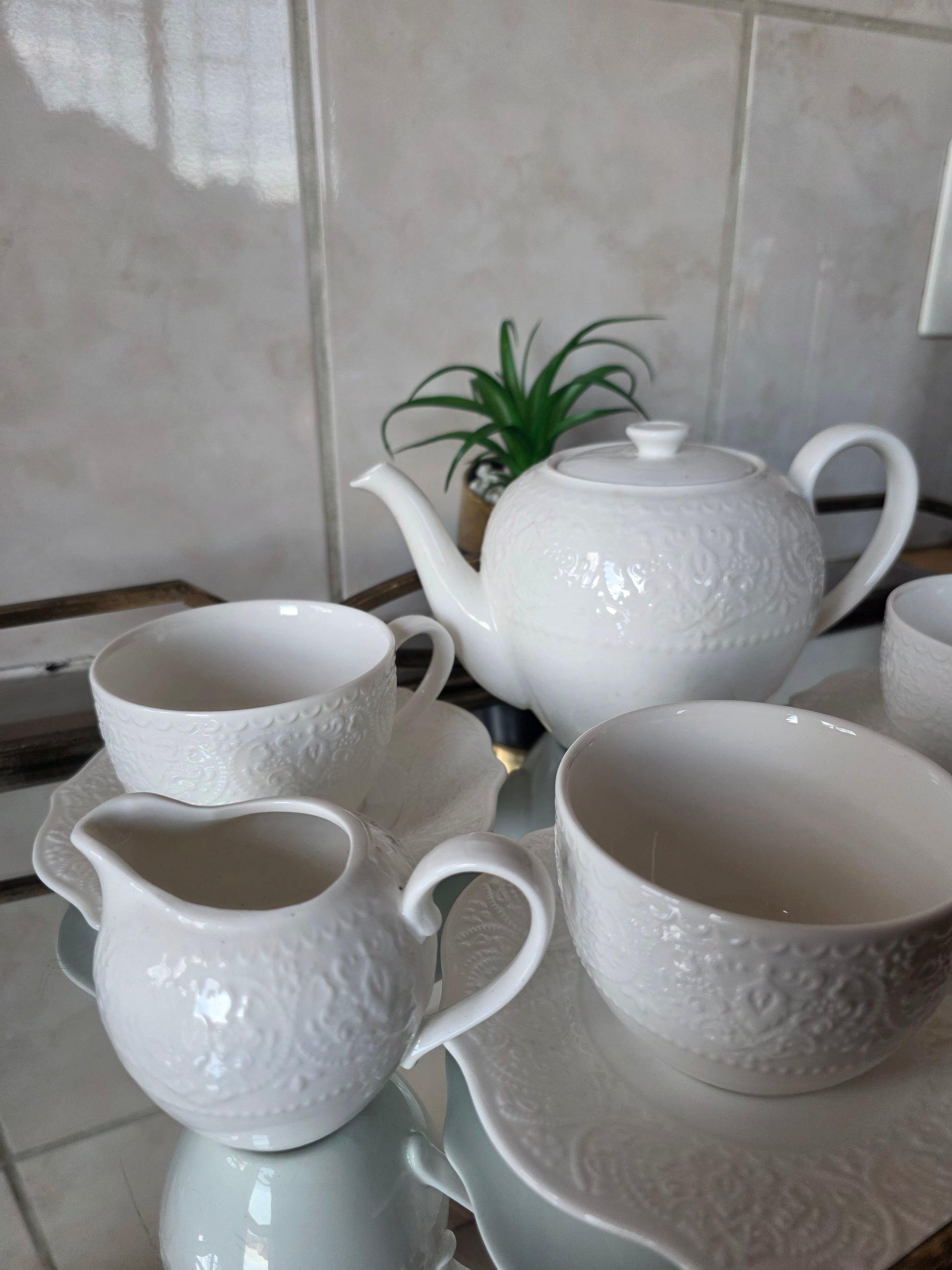 14-piece elegant tea set arranged on dining table