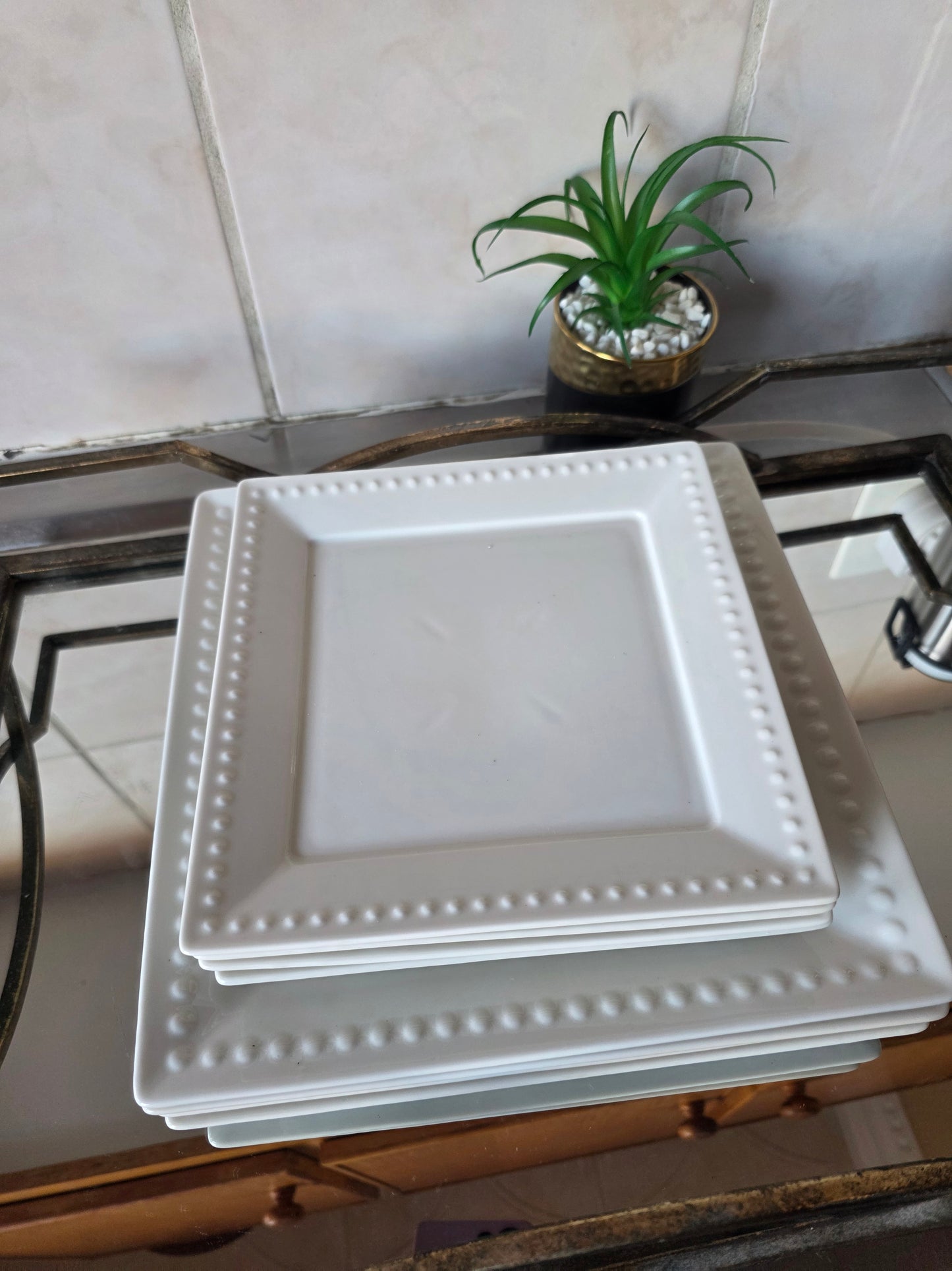 Dinner plate from 8-piece set styled with a plated meal